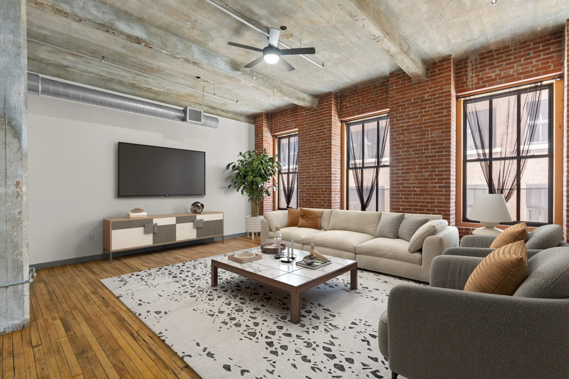 Vista loft living room with concrete ceilings and oversized windows